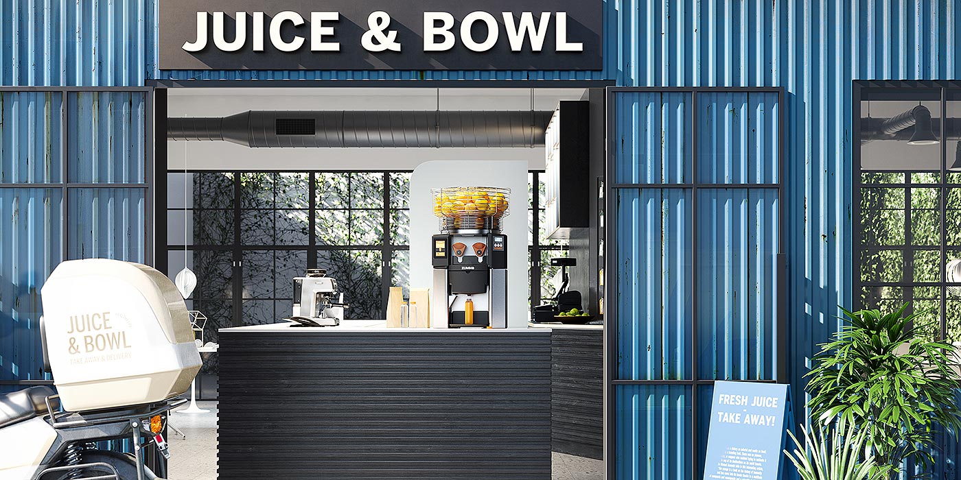 Spremiagrumi professionale Zummo sul bancone di una bancarella Juice & Bowl